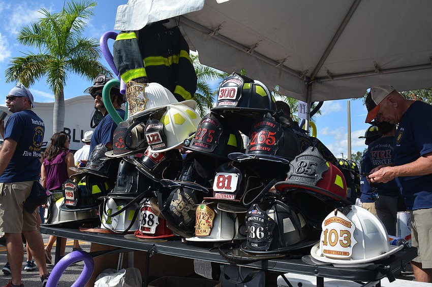 Most fire departments displayed their helmets next to their booths. The firefighters behind these North Port helmets ended up taking the gold.