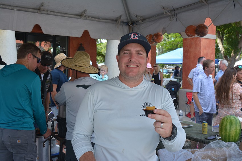 Taylor Clegg with Cedar Hammock Fire Department topped their chili with an onion ring chunk.