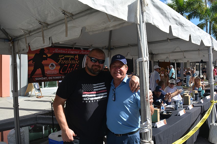 Celebrity judges included former NFL player David Baas, left, and ABC 7 Chief Meteorologist Bob Harrigan, right.