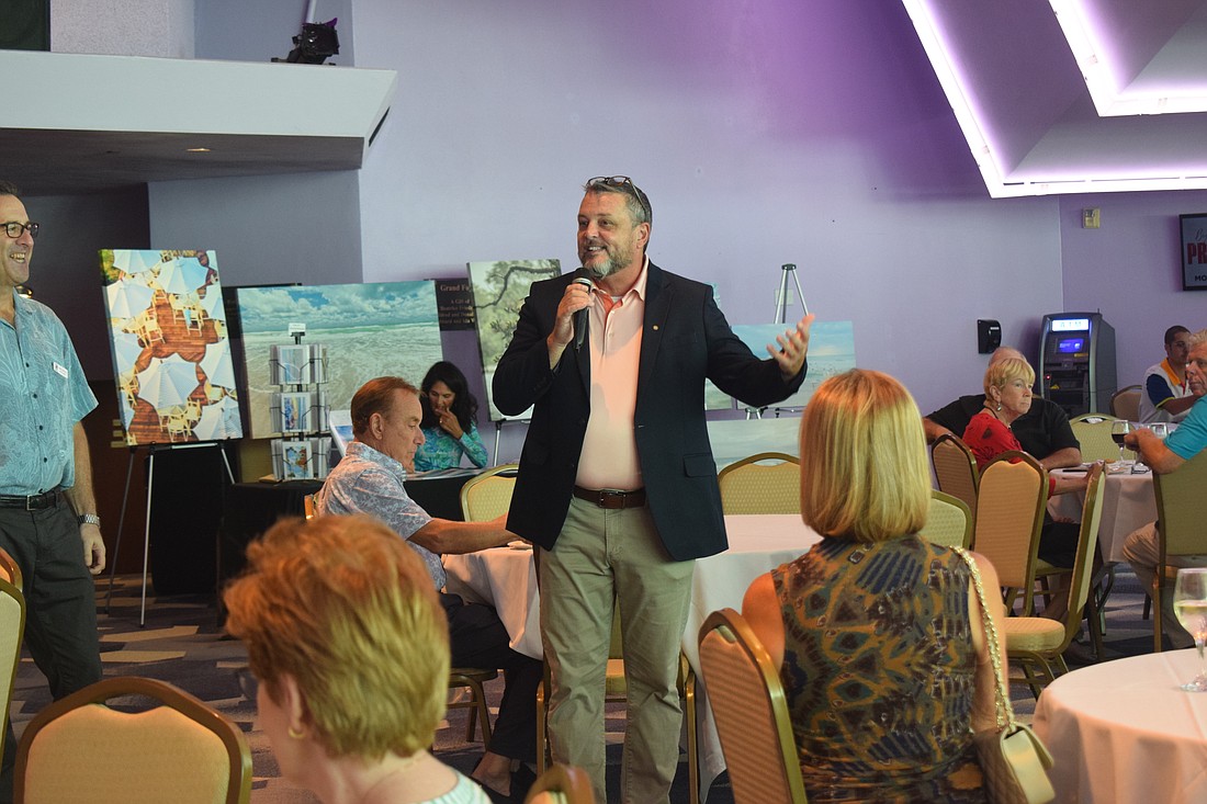 Brian Walton, new executive director of Save Our Seabirds, introduces himself to guests at For the Birds.