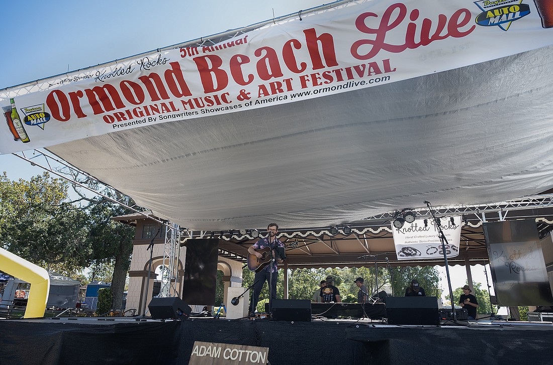 Jacksonville musiciain Adam Cotton performs on the main stage at the Ormond Beach Live music and art festival. Photo by Michele Meyers