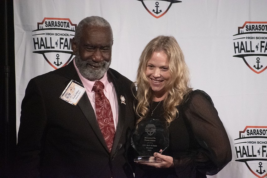 Fredd Atkins received his Community Steward Award from co-organizer Jeana Schmidt.
