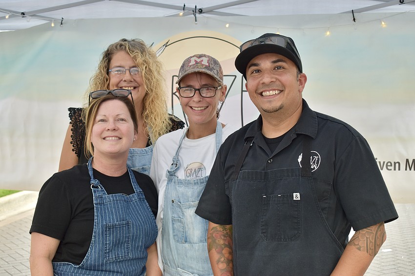 Heather Hernandez, Tricia and Michelle Sarata and Jason Hernandez work the Graze Street AMI booth.