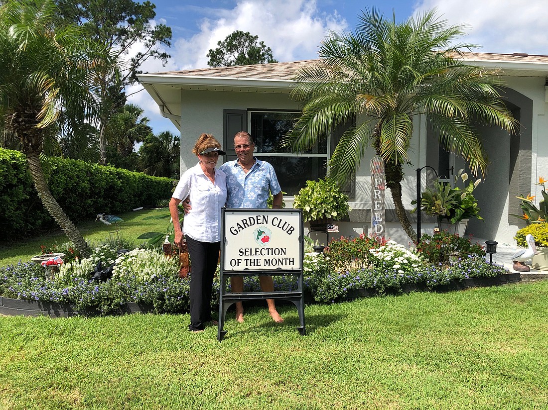 The Bird family's garden has red and white salvia, white pentas, blue daze, hydrangea, white plumeria and a variegated devil’s backbone, among other plants. Courtesy photo