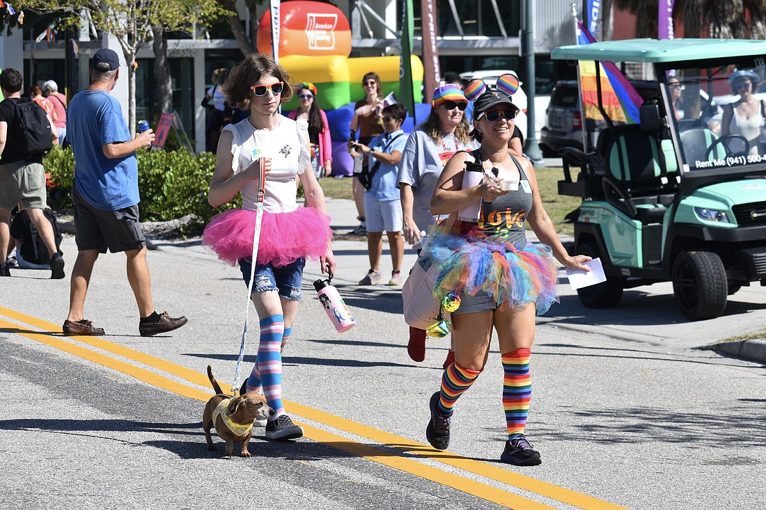 Heidi walks in the pet parade with Violet Ditucci and Krista Post.