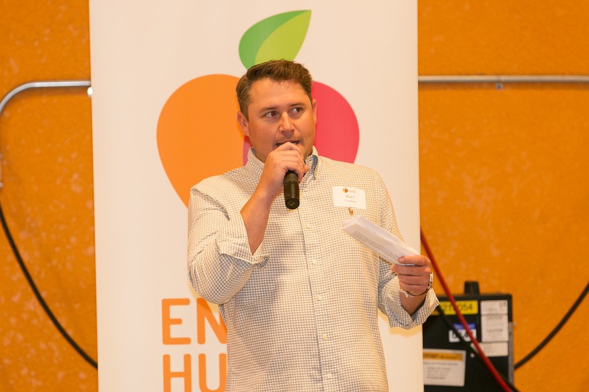 Bart Lowther, board member, emceed the evening.