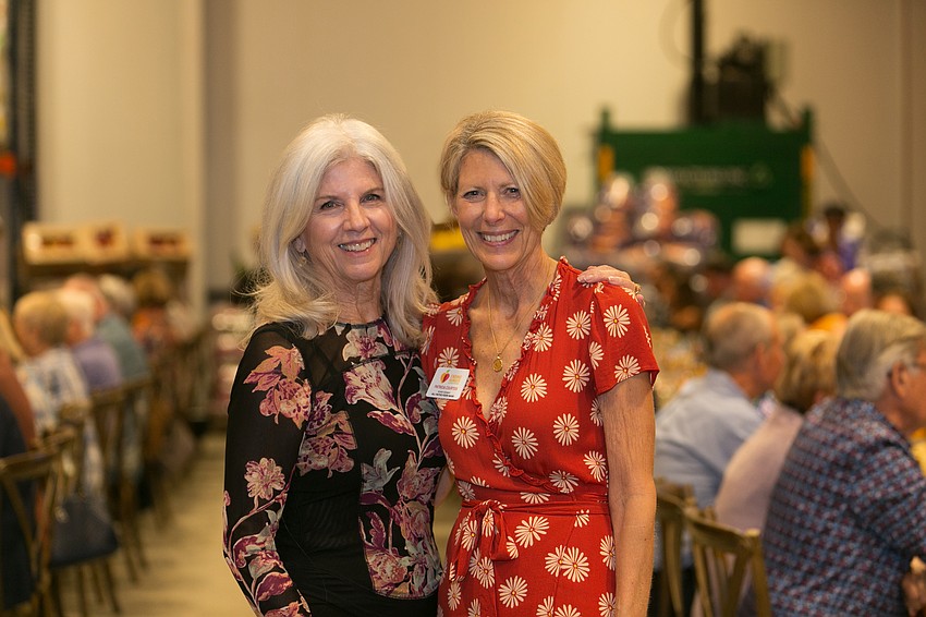 President and CEO of All Faiths Food Bank Sandra Frank with Patricia Courtois, vice chair