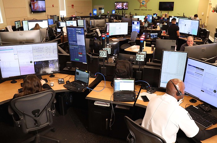 The Emergency Operations Center call center works in "pods," each team working on a certain aspect such as fire dispatch, law dispatch and call taking.