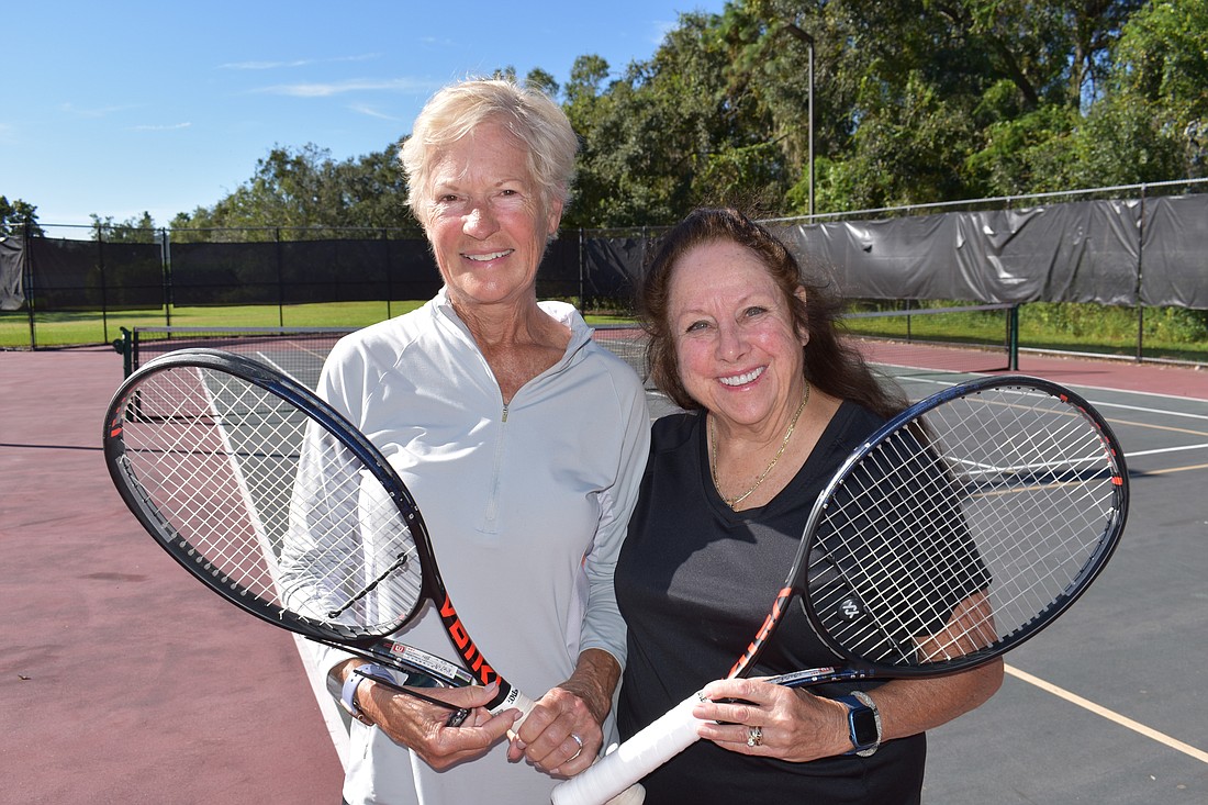 Leslie Richards and Deb Anderson of Lakewood Ranch say they haven't played a match on hard courts in years. They oppose hard courts being built at Premier Park.