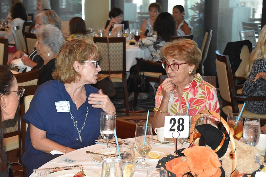 Kathy Wehking talks with Sandra Fox.