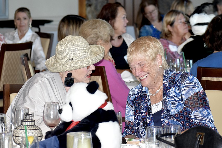 Jan Young talks with Sharon Rolle.
