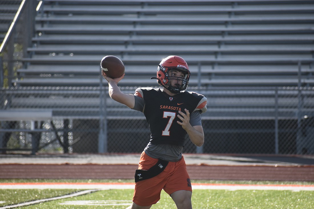 Sarasota High senior quarterback Johnny Squitieri threw for 245 yards and a touchdown against Southeast High.