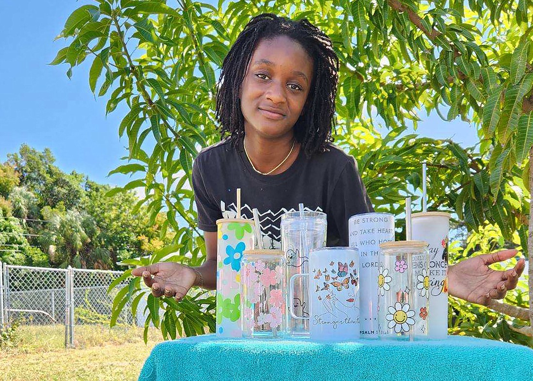 Bradenton's Cymia Martin is selling cups, tumblers and mugs at Kids Mart.