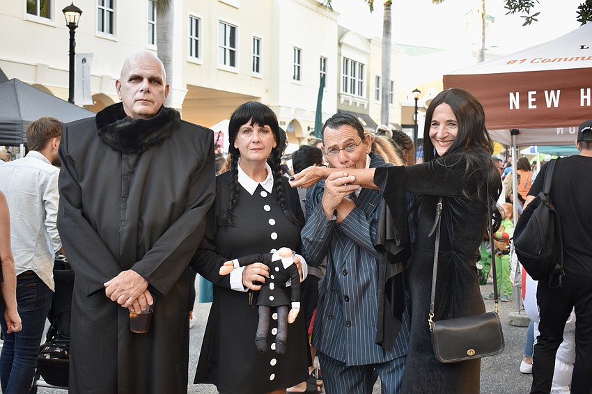 Mike and Tara Warmuth and Terry and Madeleine Eagle dress up as characters from 