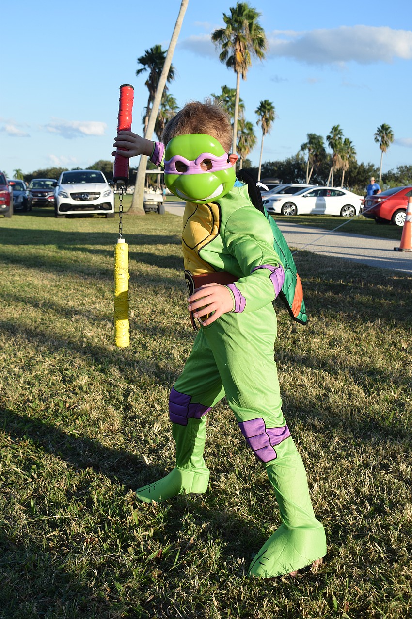 Lakewood Ranch 9-year-old Raymond Perkowski, dressed as a ninja turtle, takes home the prize for silliest costume. 