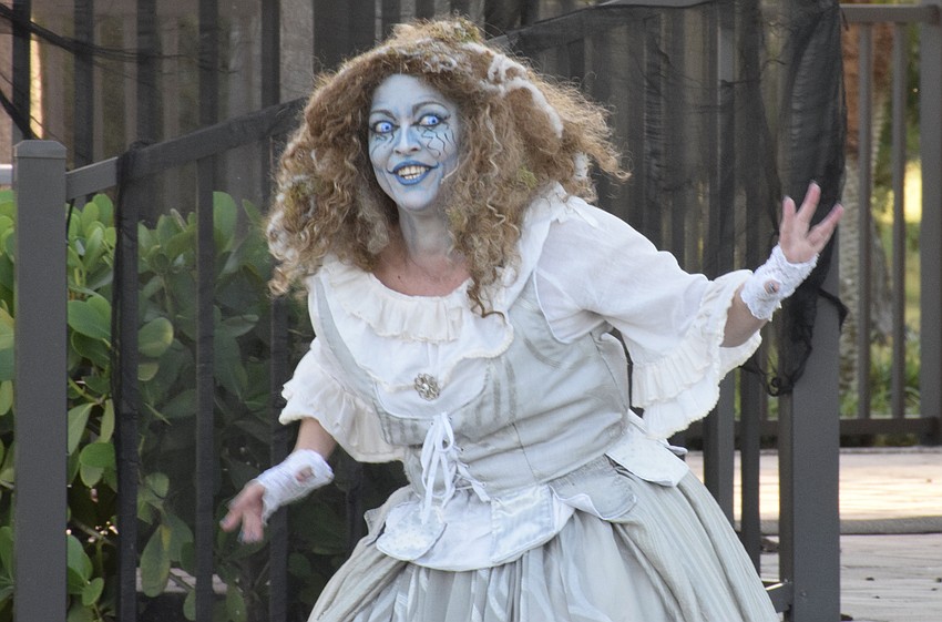 Cristina Bickerstaff strikes fear into the audience as the Woman in White.