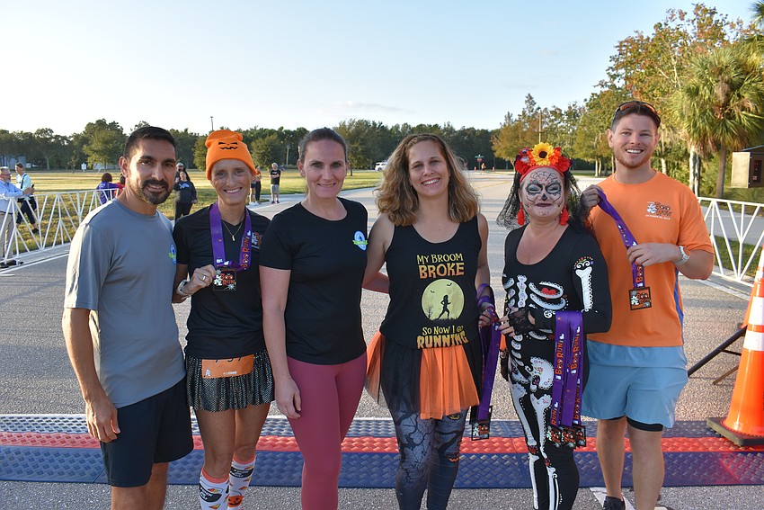 Among those putting together the Boo Run are Alex Figueroa, Jen Tullio, Brooke Allen-Burnstein, Christine Rouse, Tammra Hellemn and Race Director Carl Albano.