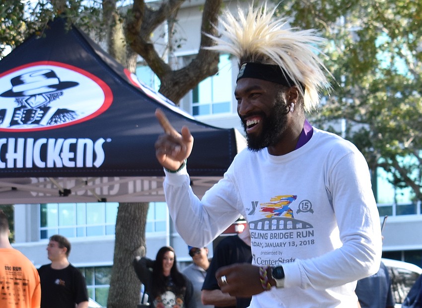Palmetto's Alvin Ducre does a little dancing after finishing the Boo Run. Ducre is a regular supporter of the race.