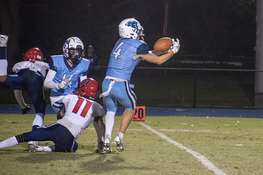 ODA senior Jack Meyers snags an interception in the fourth quarter against All Saints' Academy.
