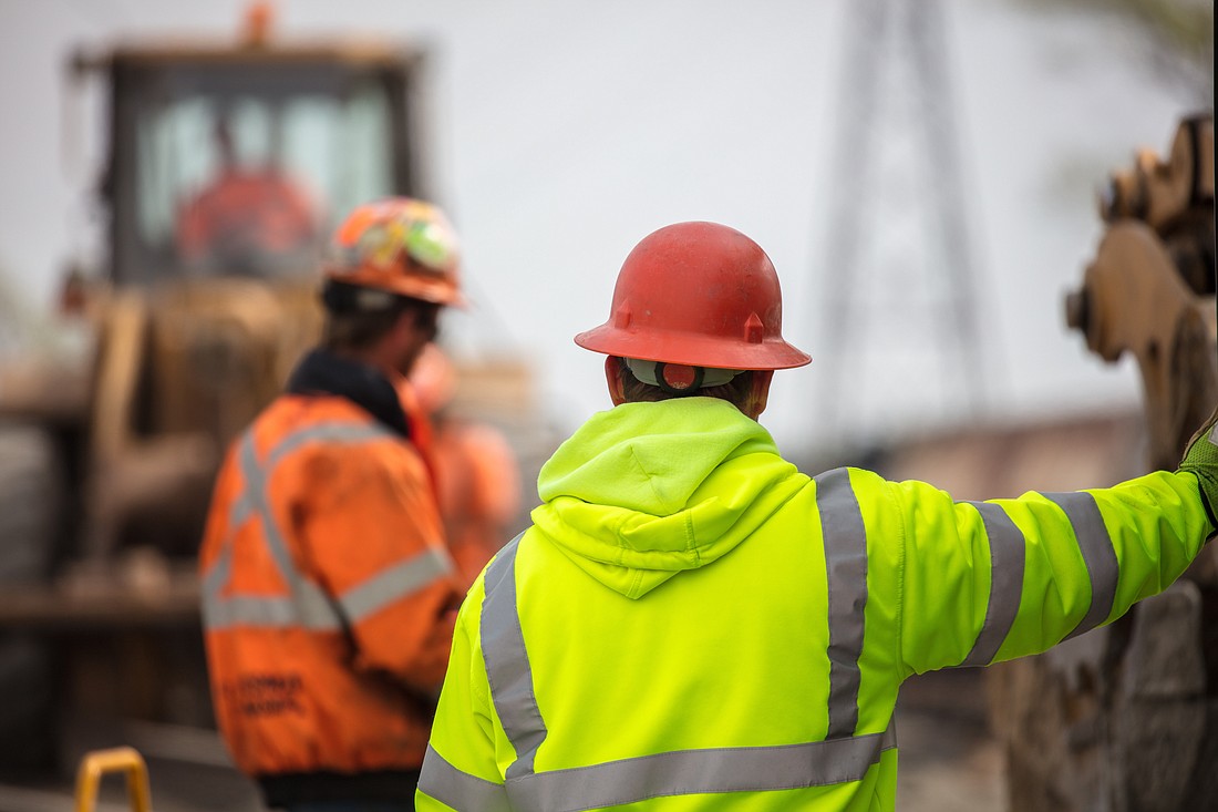 Average pay for construction workers is expected to increase by $15.05 per hour over the next decade.