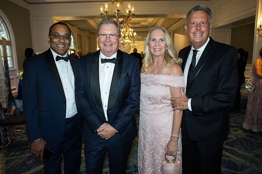 Satish Maripuri, Peter Teuber, Kristie and Keith Harrison