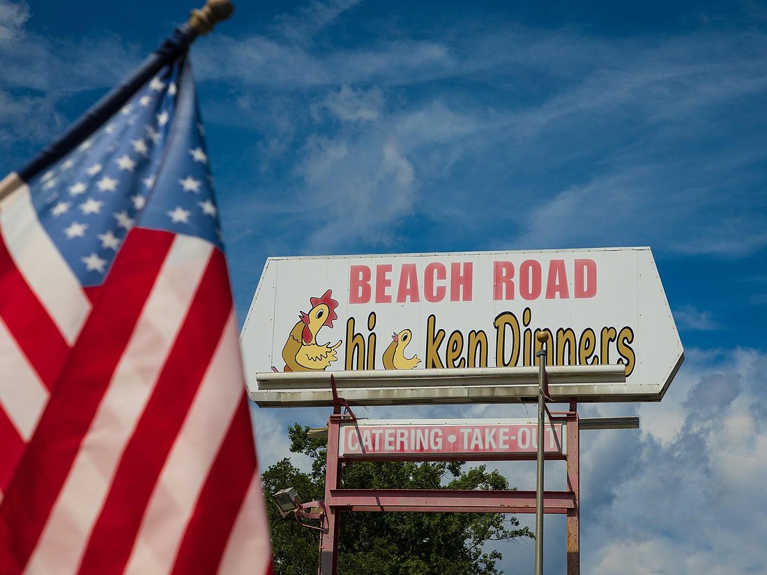 The original Beach Road Chicken Dinners sign is shown on this photo from the Beach Road Fish House and Chicken Dinners on Facebook. The original sign is for sale. The Beach Road Fish House and Chicken Dinners restaurant building has been demolished.