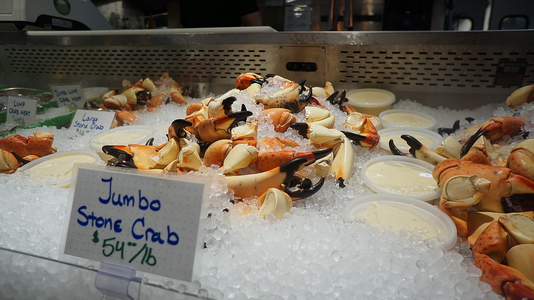 Freshly caught stone crab claws wait to be bought at Walt's Fish Market.