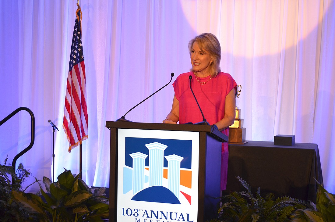 Teri Hansen, president and CEO of the Charles and Margery Barancik Foundation addresses the Sarasota Chamber membership at its 103rd annual meeting on Oct. 27, 2023.