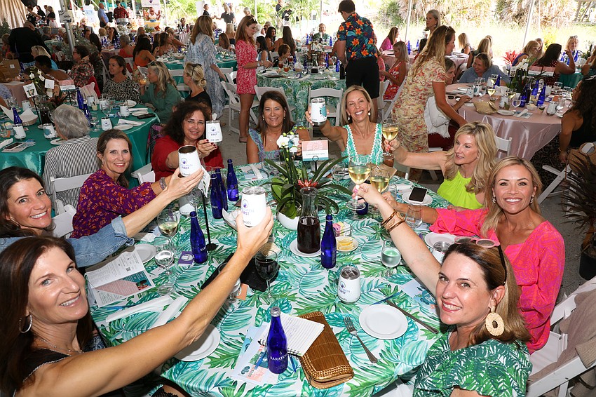 Leslie Jones, center, celebrates with friends at the Children First Flip Flops & Fashion event.