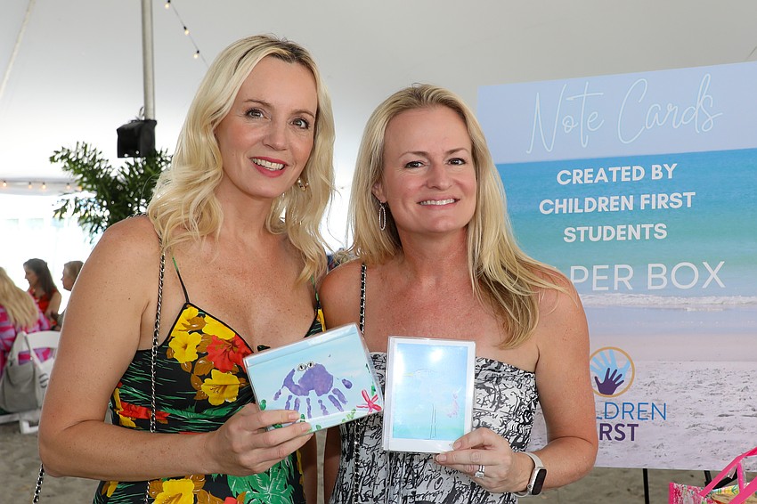 Rachel Palazzolo and Sherri Lin purchased boxed note cards made from children's handprints.