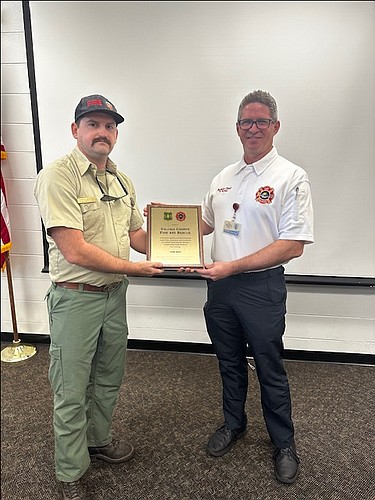 U.S. Forest Service forestry technician Ryan Hopkins and Volusia County Fire Service Battalion Chief Scott Smoak. Photo courtesy of Volusia County