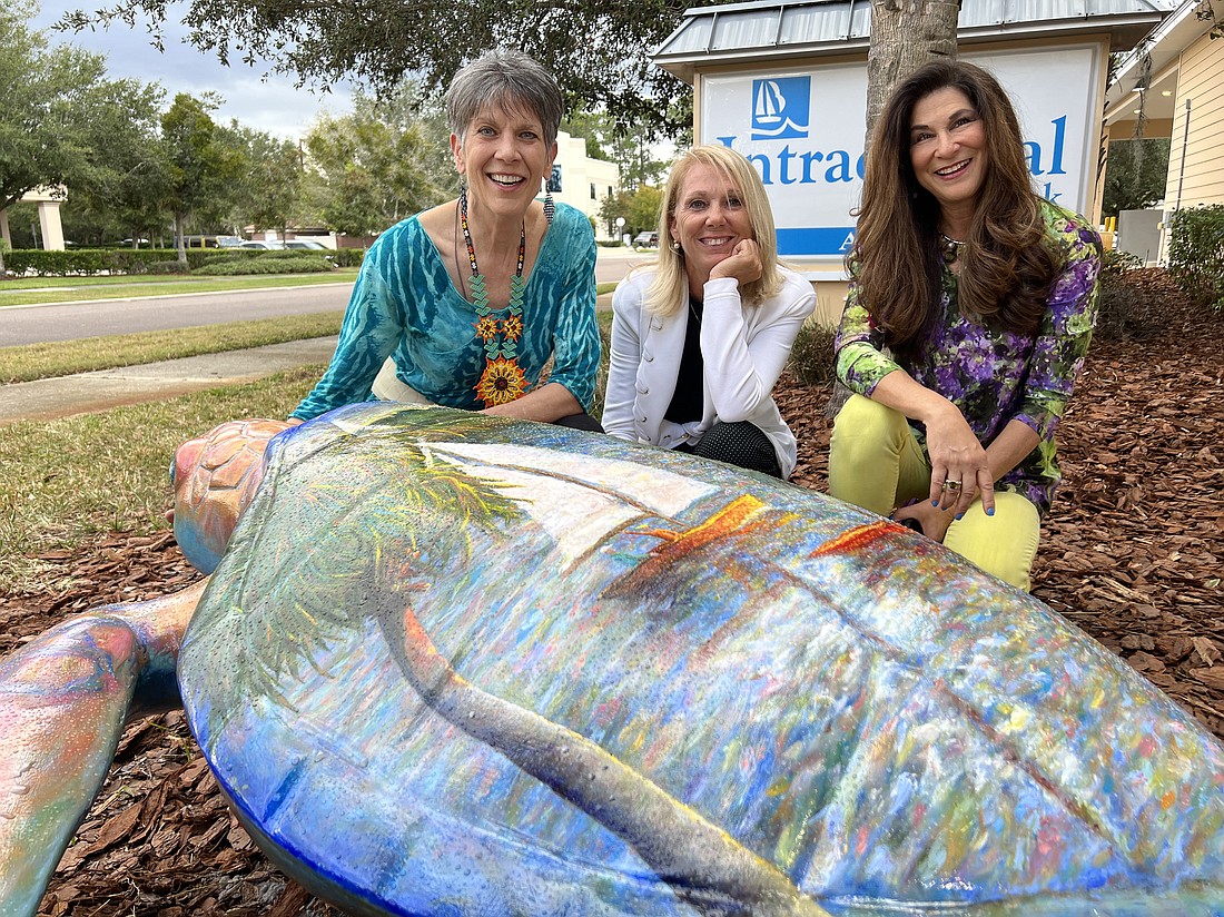 Nancy Zedar, Nancy Crouch and Lisa Fisher with "Renny." Courtesy photo