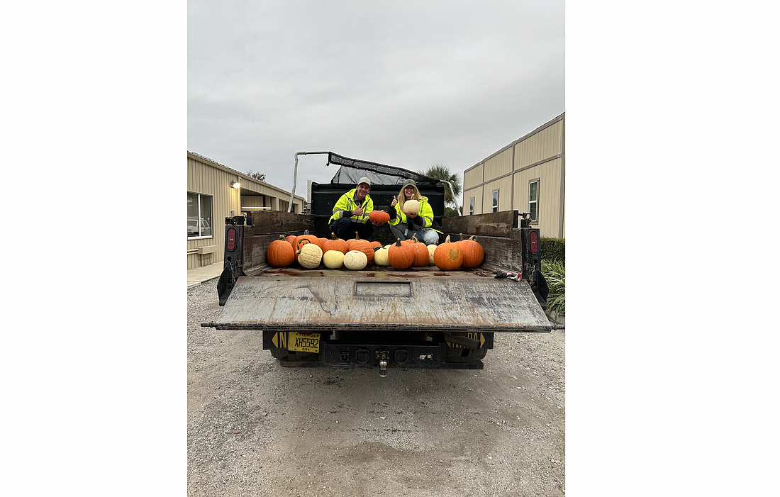 Chief Sustainability Officer Maeven Rogers with members of the City of Palm Coast Public Works department during the Great Pumpkin Compost Event. Photo courtesy of the city of Palm Coast