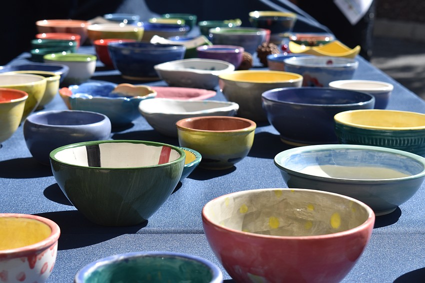 The soup is served on site, but each attendee gets a bowl to go.