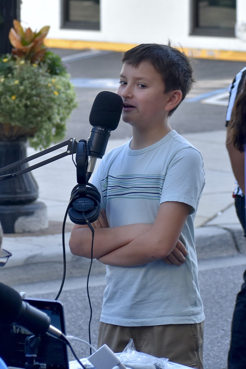 Ivan Gorodnitchev, 10, introduces himself to the attendees.

After receiving word of the competition that morning, Gorodnitchev headed out with his family to give it a try. 


