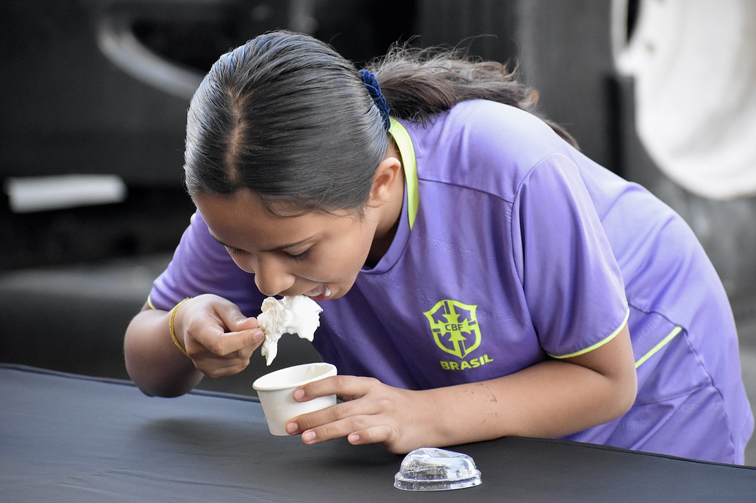 Leila Schaedler-Luera, 10, goes all-in for the challenge.