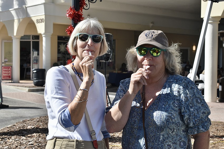 Bradenton resident Pat Rup brings a friend from New Hampshire, Karen Alden, to taste soup.