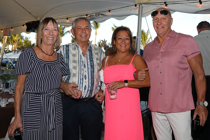 Pam Holic and her husband, former Venice Mayor John Holic, are enjoying the cocktail hour with Debbie and Jim LaPinska.