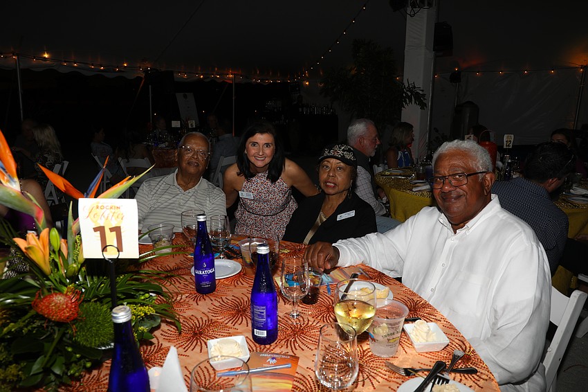 Lacy Ray, Jessica Rogers, Jacqueline Ray and Tom Cunningham catch up just before dinner.