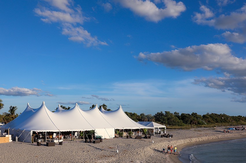 Children First presents its 11th annual Rockin' Lobster held under tents set up on the sand at Sharkys on the Pier, overlooking the Gulf of Mexico in Venice, Florida.