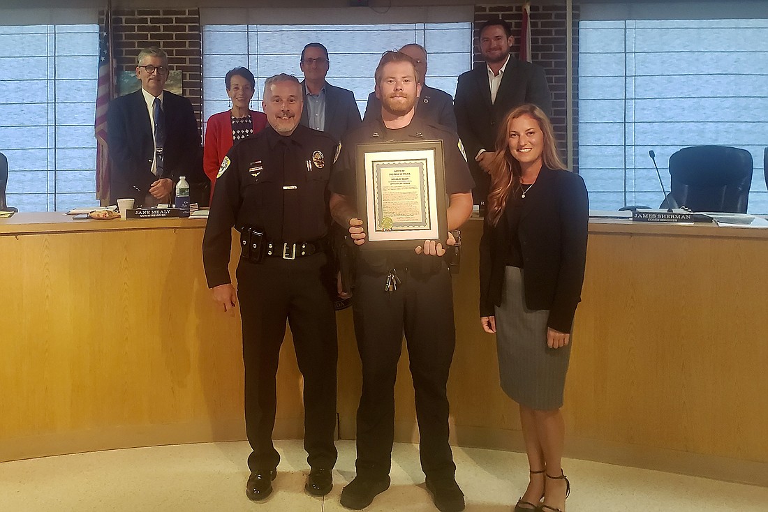 Flagler Beach Police Officer Dylan Coffman was awarded the FBPD Medal of Merit at the Oct. 26 Flagler Beach City Commission meeting. Photo courtesy of Flagler Beach City Manager Penny Overstreet