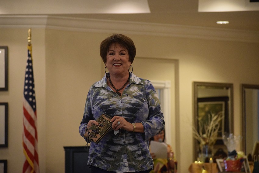 Joyce Giaconia is all smiles as she makes her way down the runway.