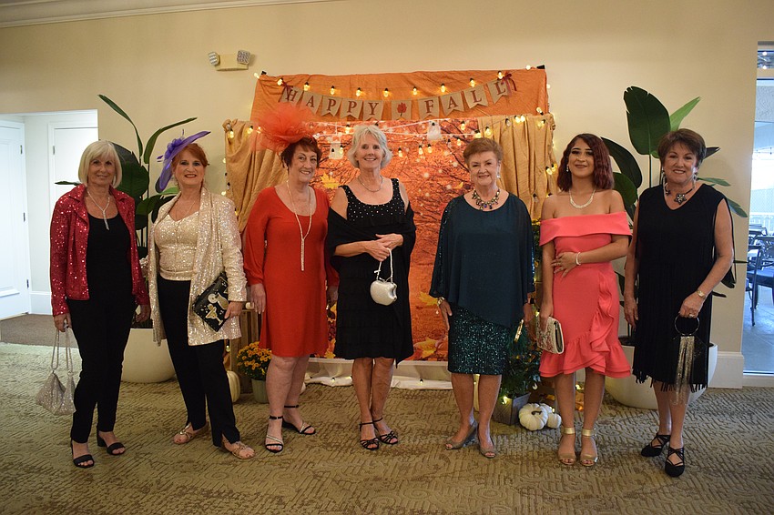 The models make their final pose at the end of the fashion show.