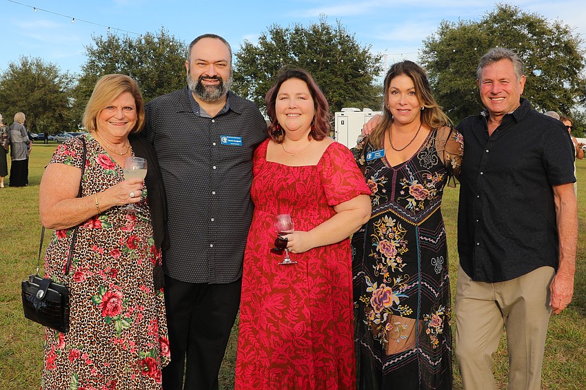 Kim Bouchard, board Vice Chair Ramin Mesghali, Deanna Mesghali, board member Debbie Casely and her husband, Mike.
