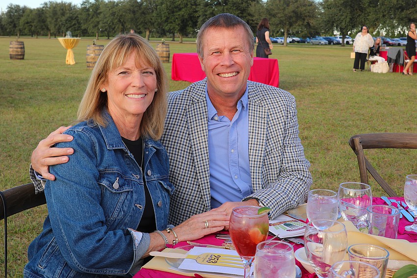 Kathy and Jeff Paulsen are all smiles during Farm to Table.