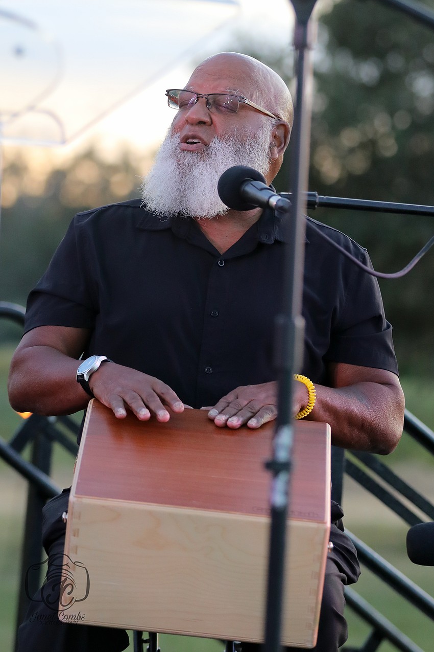 Acclaimed jazz vocalist Fred Johnson accompanies bassist Michael Ross to entertain the crowd.