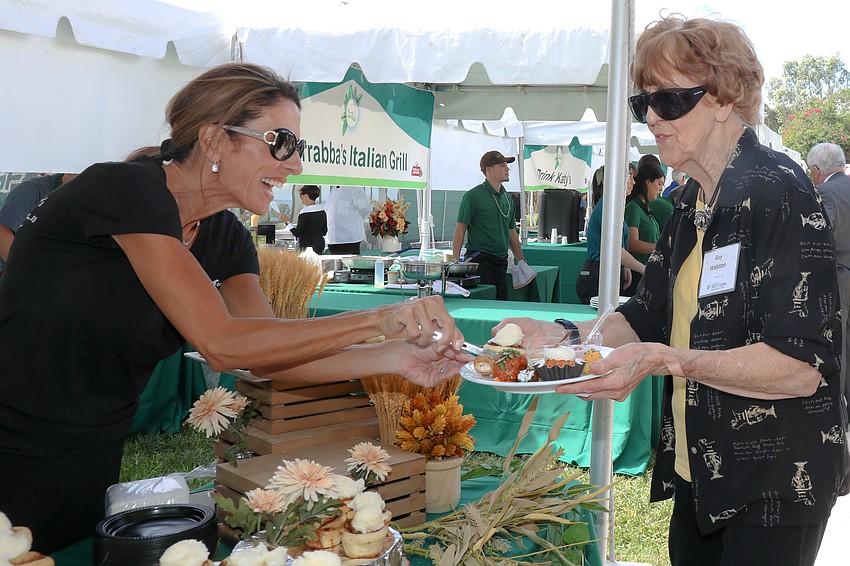 Patti Corcoran serves Ray Walston.