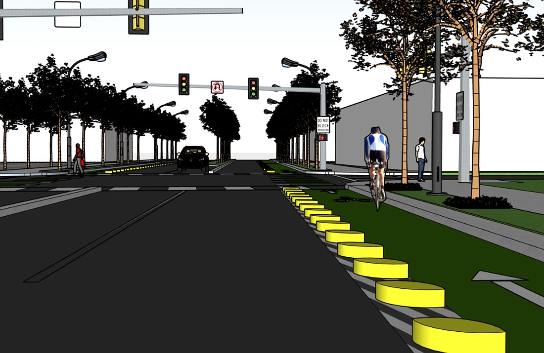 A generic concept of a complete street with dedicated bike lanes and center median, similar to plans for 10th Street.