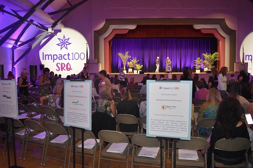 Posters for the different nonprofits line the seating area at Sarasota Municipal Auditorium.
