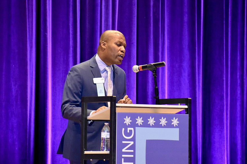 Venice Theater executive director Kristofer Geddie offers a presentation.